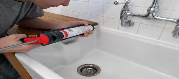 What are the benefits of professional caulking services?